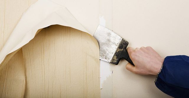 Botanical wallpaper accent showing precise seam and finish quality